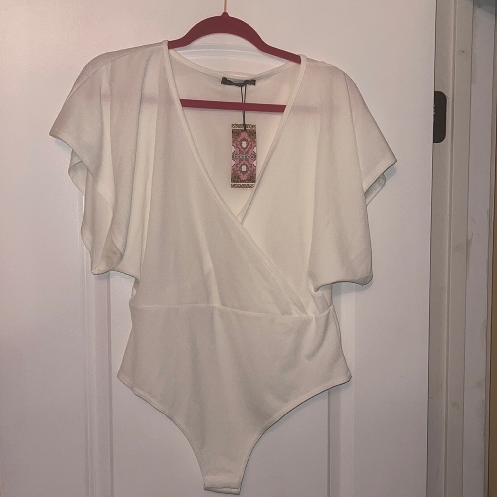NWT White short sleeved bodysuit with snap bottom size 12